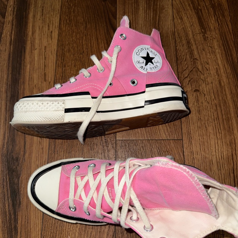Converse Pink and White High-Top Sneakers with Iconic Star Logo